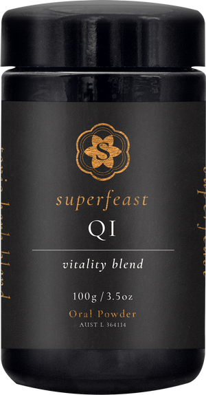 A supplement container of QI Blend by SuperFeast