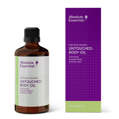 A supplement container of Untouched: Body Oil by Absolute Essential