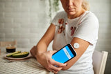 An image of a client using the CGM